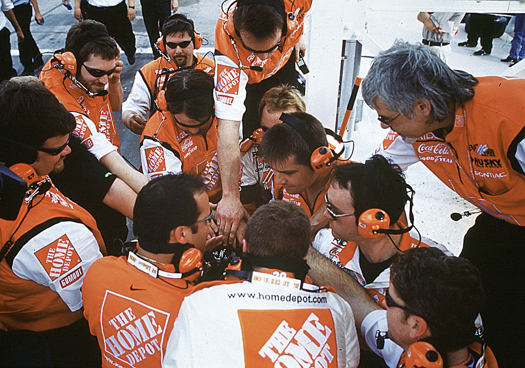 Greg Xipadelli rallies his pit crew before a race