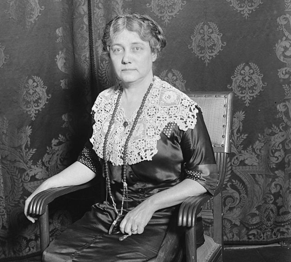 portait of nellie bly sitting in chair
