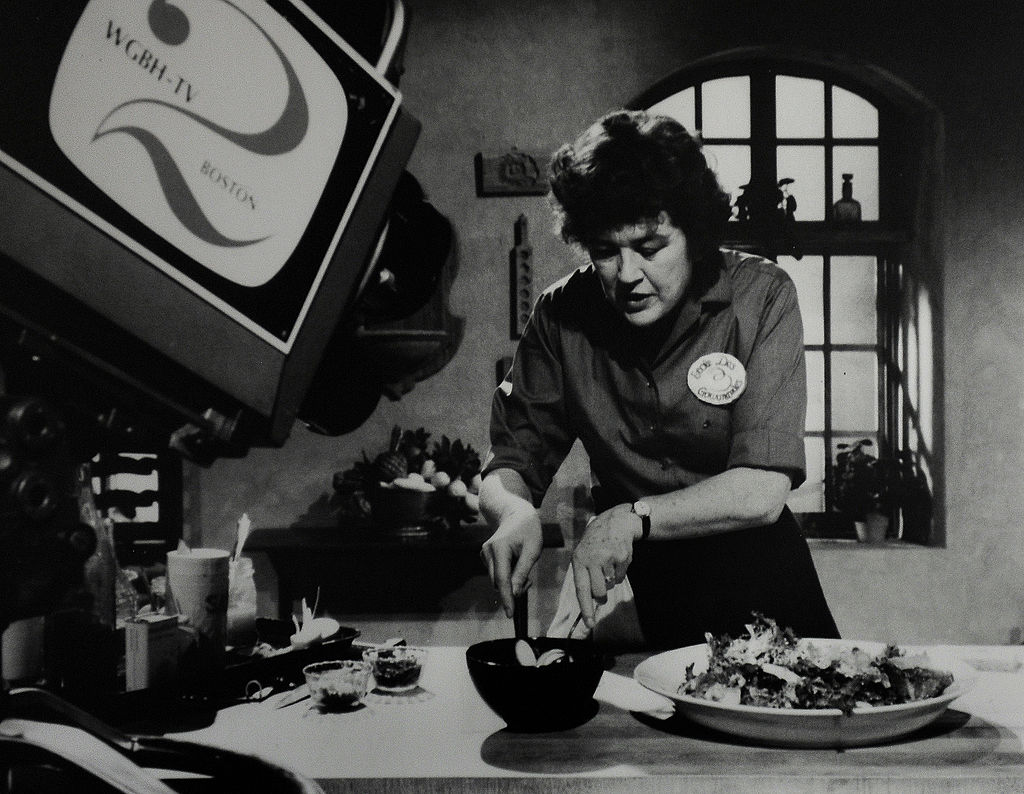 On display is a vintage photo of Julia Child taping a TV show in her kitchen