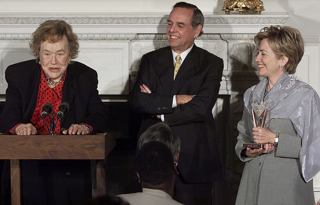 US First Lady Hillary Clinton (R) and Sara Lee Corporation Chairman and Chief Executive Officer John Bryan (C) listen 21 October, 1999 to chef and television personality Julia Child (L) at the White House in Washington, DC