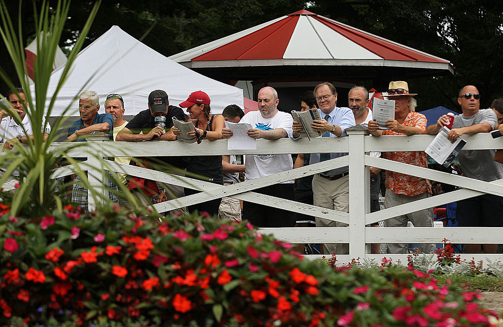 spectators placing bets