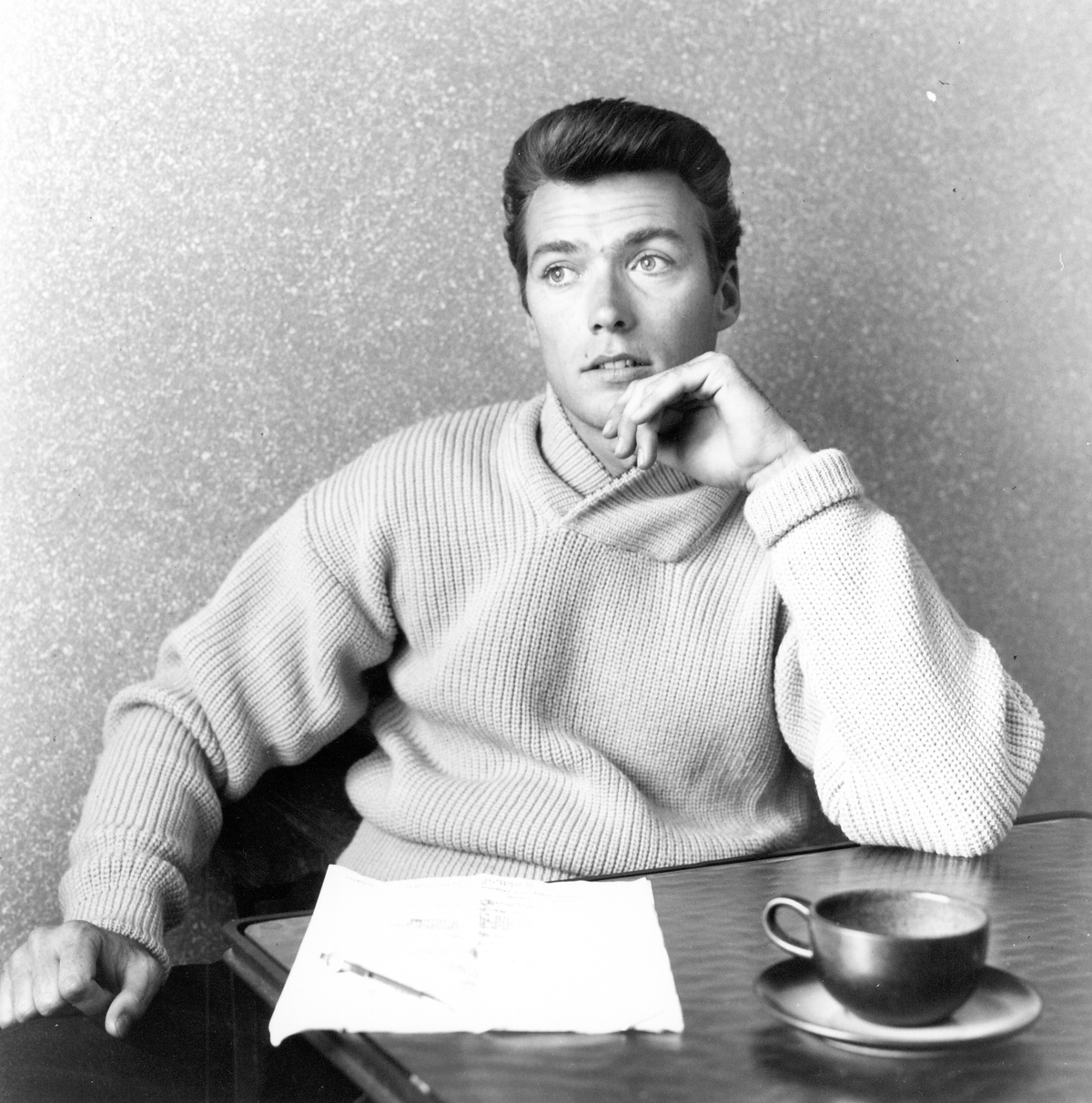 Actor Clint Eastwood drinks a cup of coffee at home on June 1, 1956 in Los Angeles, California.