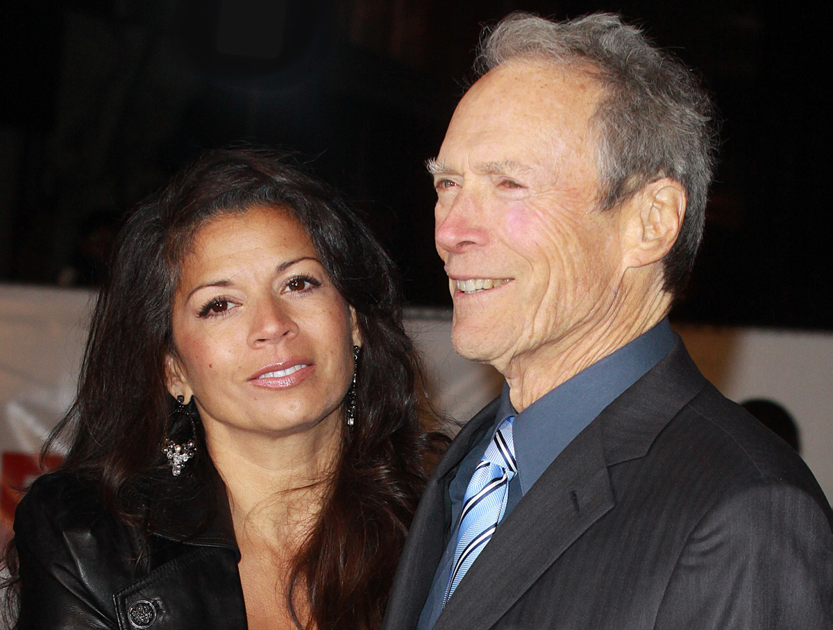 Clint Eastwood and wife Dina Ruiz attends the UK Film Premiere of 'Invictus' at Odeon West End on January 31, 2010 in London, England.
