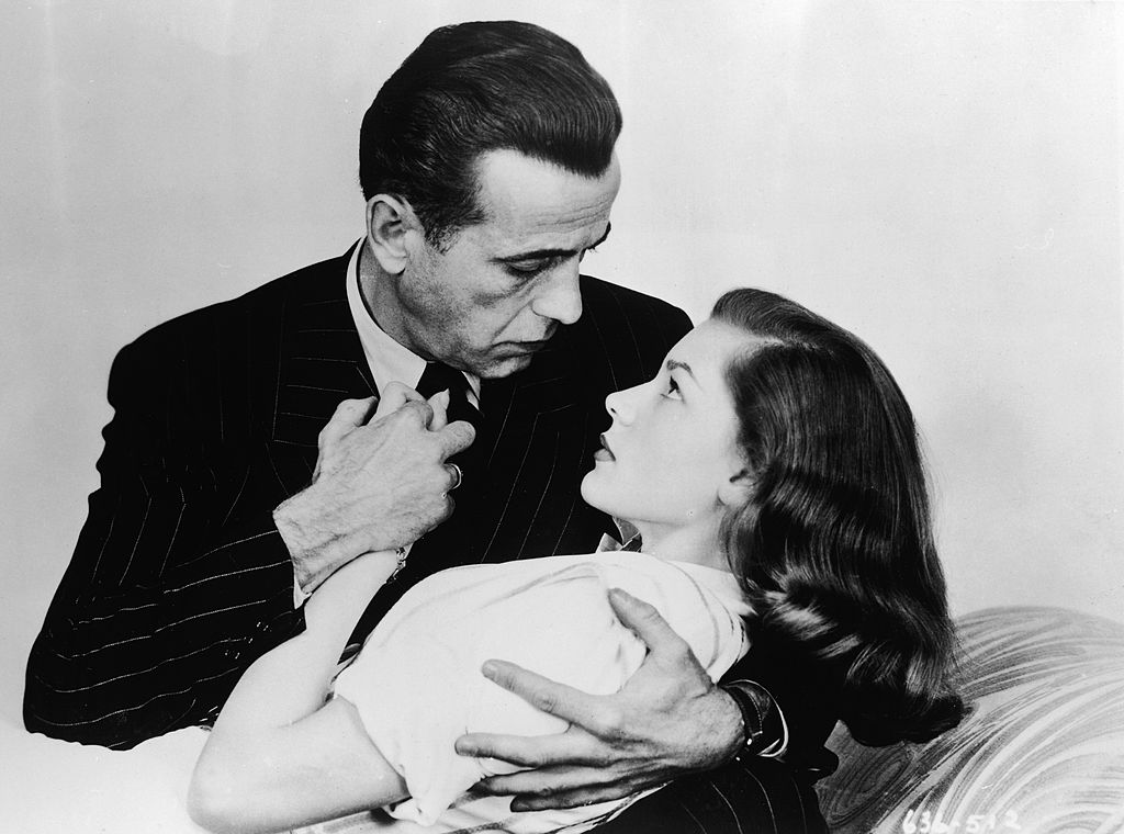 bacall and bogart in an embrace