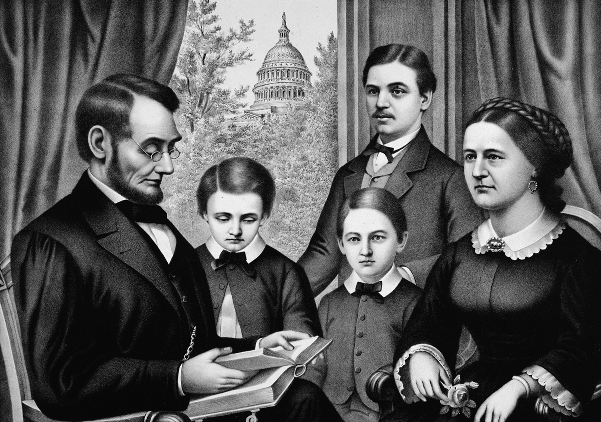 Abraham Lincoln, the sixteenth US President with his youngest son Thomas 'Tad', William 'Willie'',, his eldest son Robert, and the First Lady Mary Todd Lincoln.