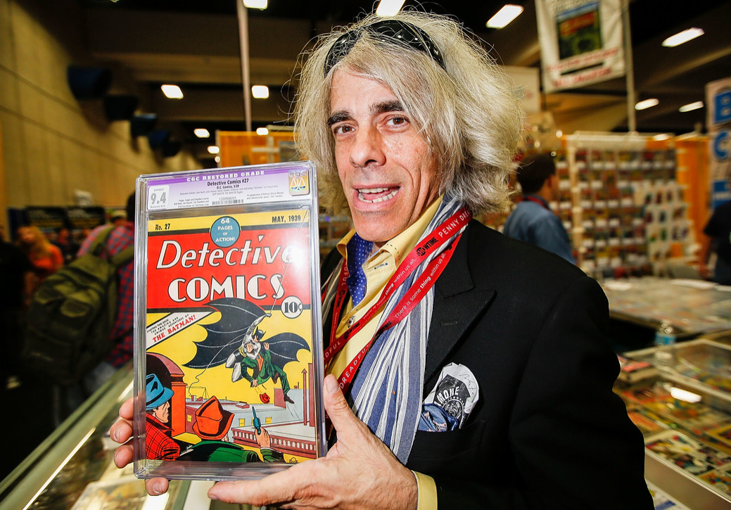 Michael Carbonaro of D&A Cardworld poses with Detective Comics #27 at Comic-Con International at San Diego Convention Center