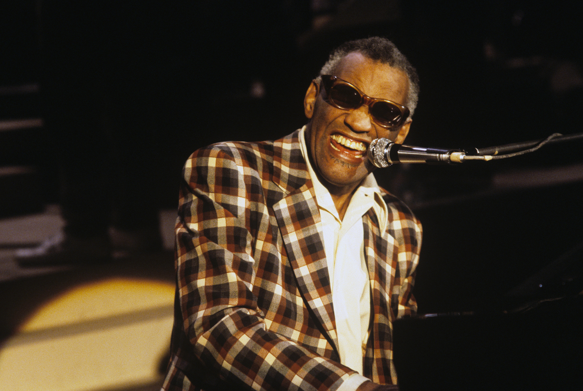 Ray Charles sings at the piano