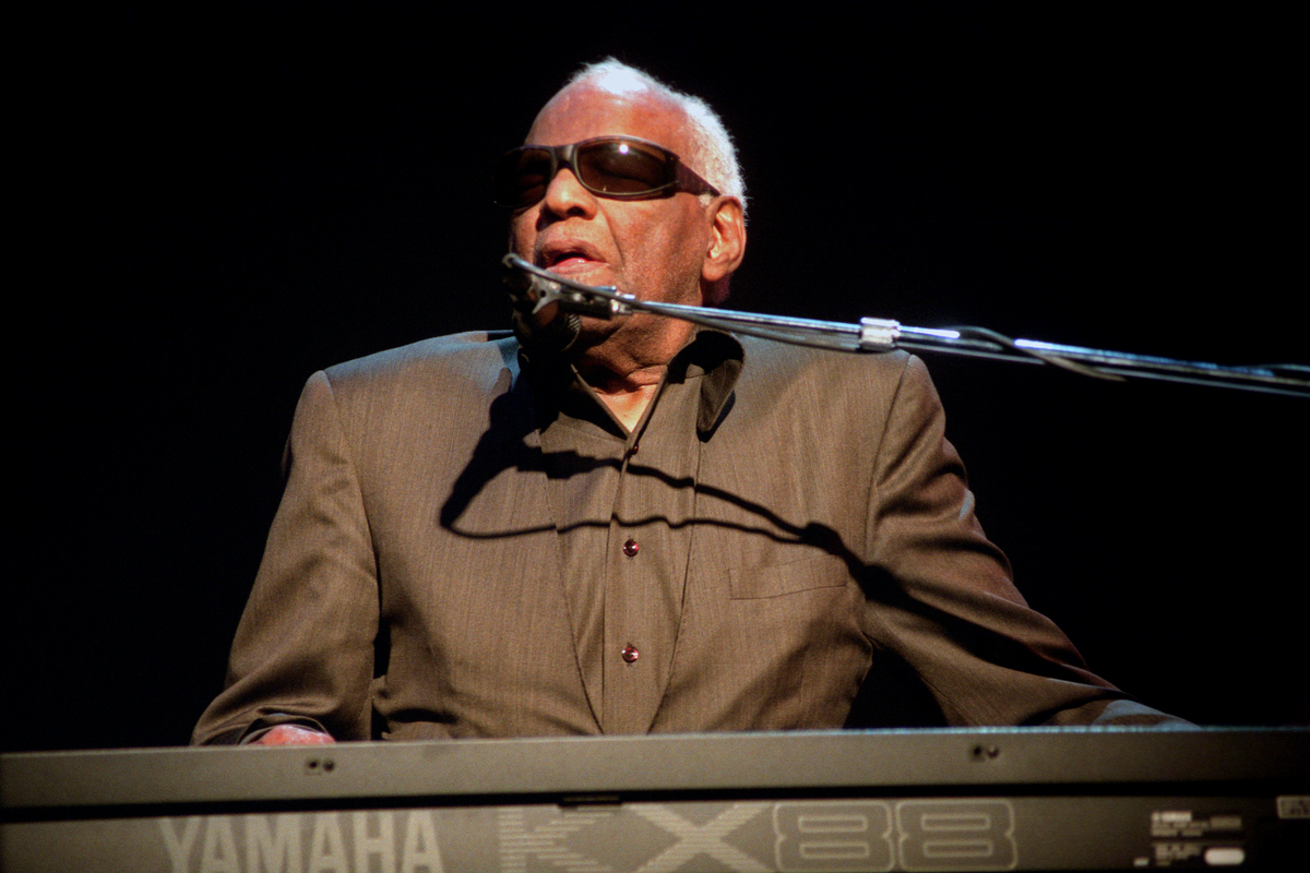 Ray Charles croons at the piano