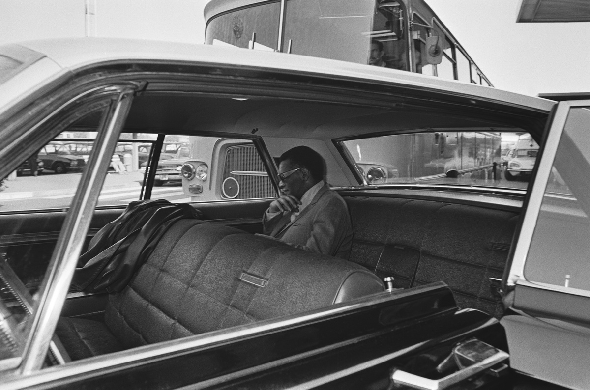 Ray Charles sits in a car
