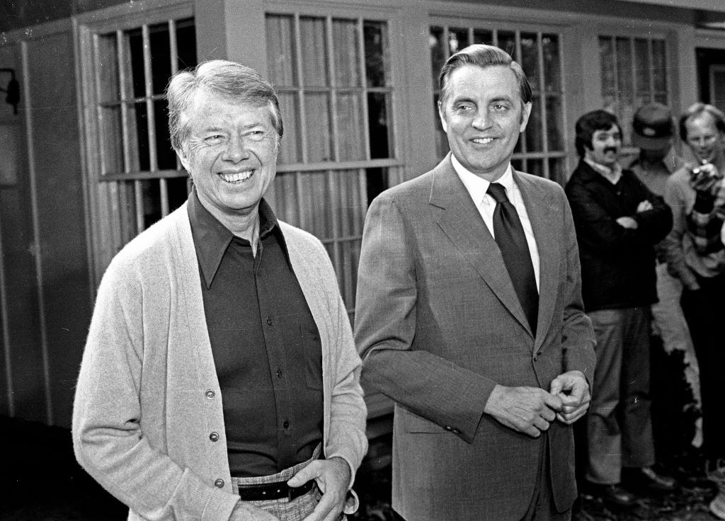 View of American politicians US President-Elect Jimmy Carter (left) and US Vice President-Elect Walter Mondale as they share a laugh prior to a press conference, Plains, Georgia, November 4, 1976.