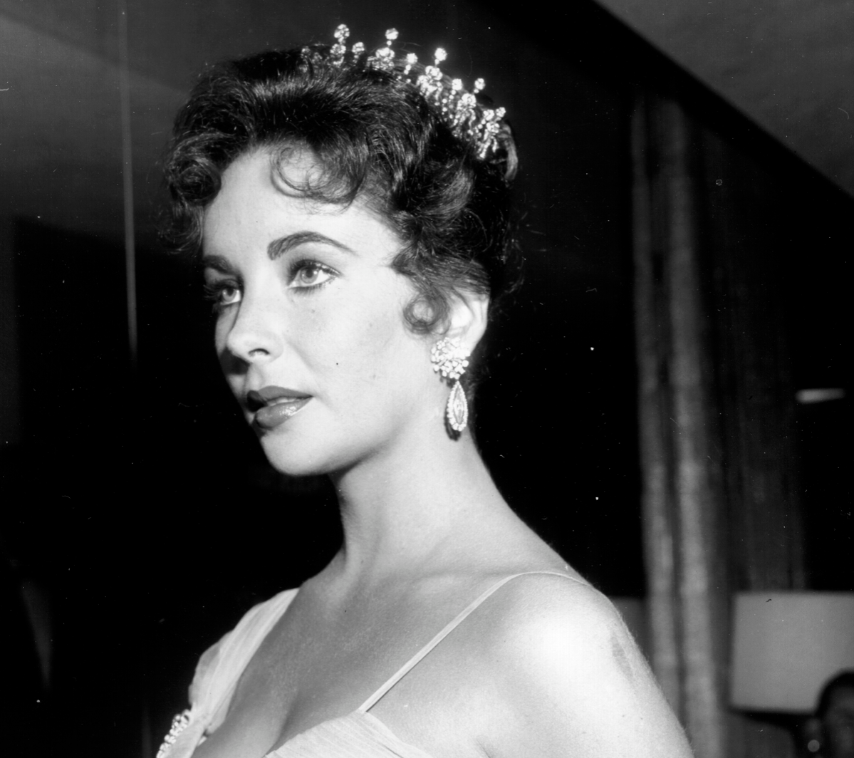 Elizabeth Taylor wearing a tiara dating back to the 1880s at the 1957 Academy Awards
