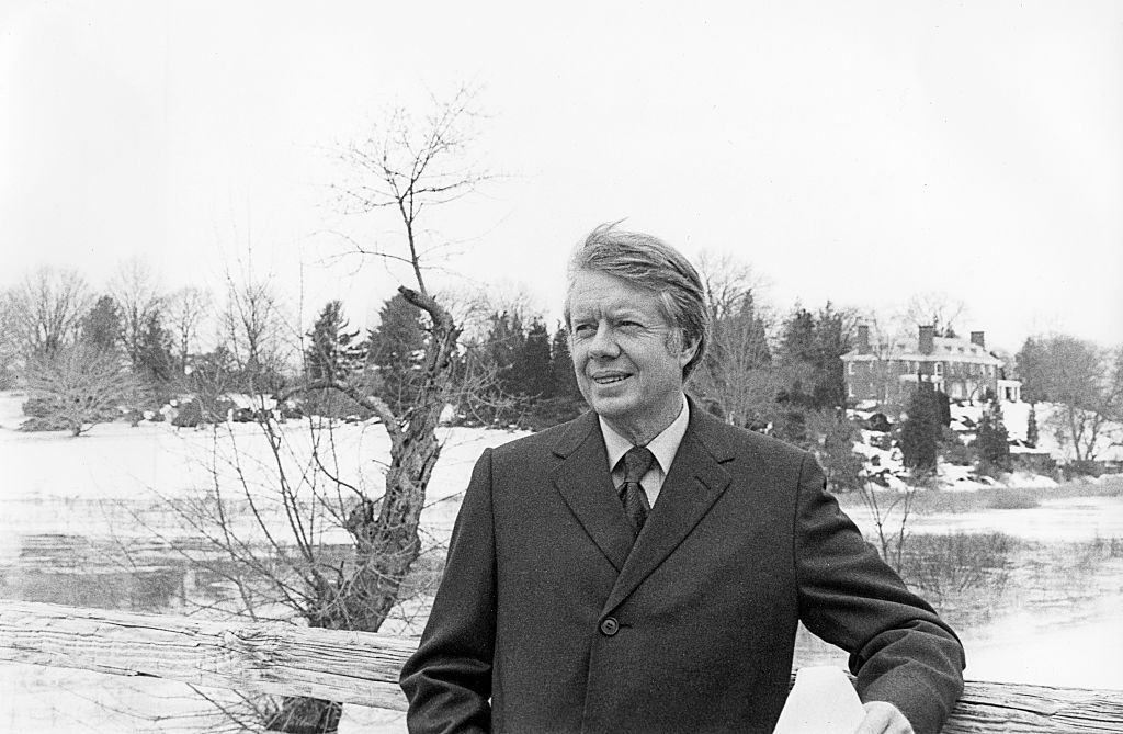 Portrait of American politician and US Presidential candidate Jimmy Carter on the North Bridge during campaign stop, Concord, Massachusetts,