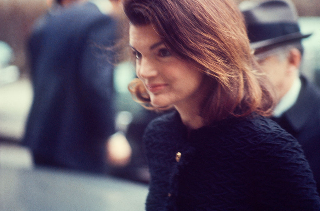a close-up of jackie kennedy on the street