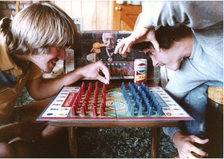 two friends playing a board game