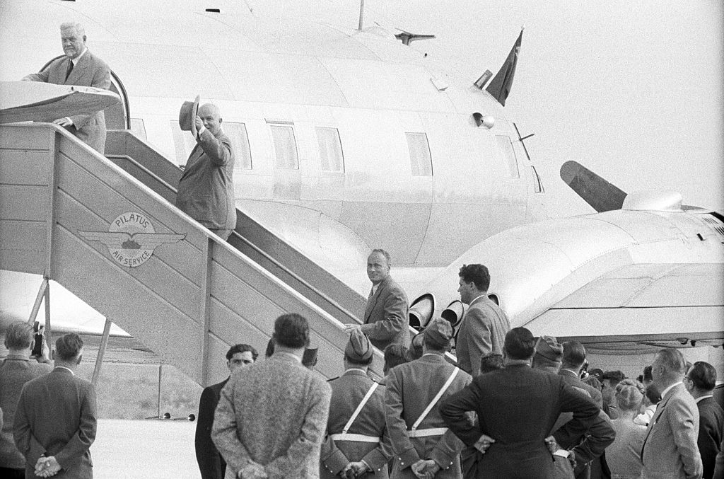 Circa 1955, the Soviet Prime Minister boards an aircraft.