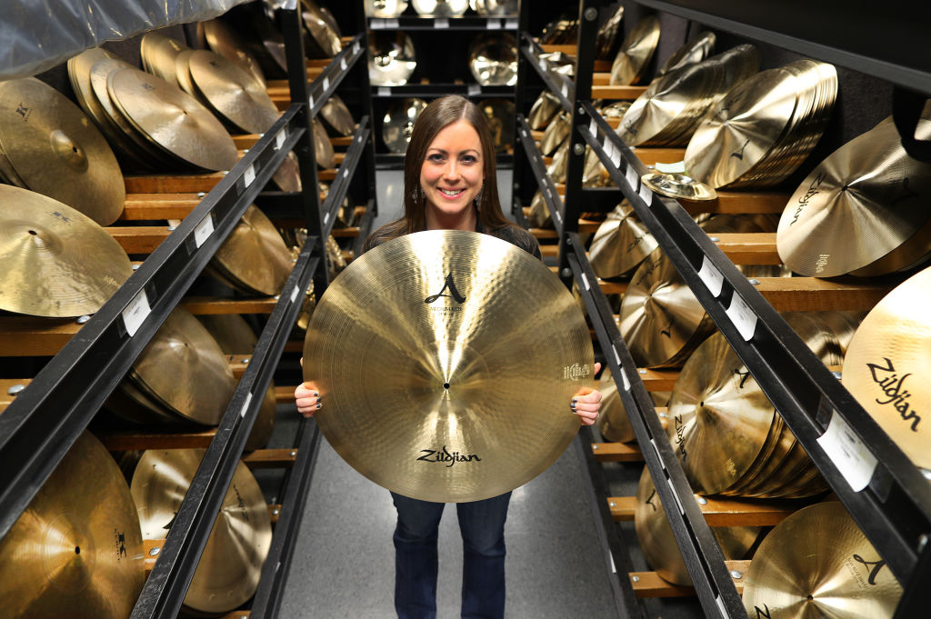 woman holding a drum