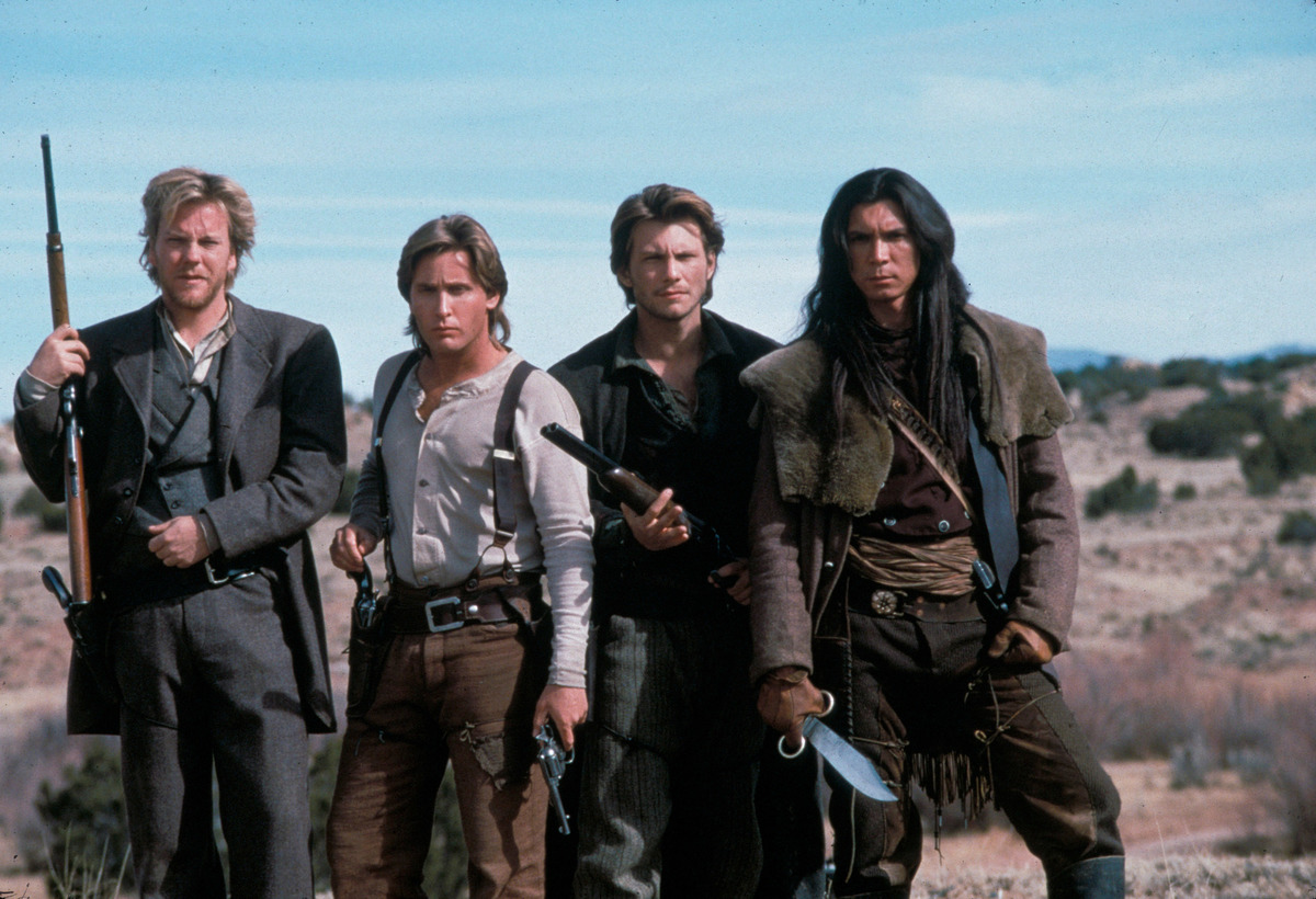 emilio estevez with the cast of young guns