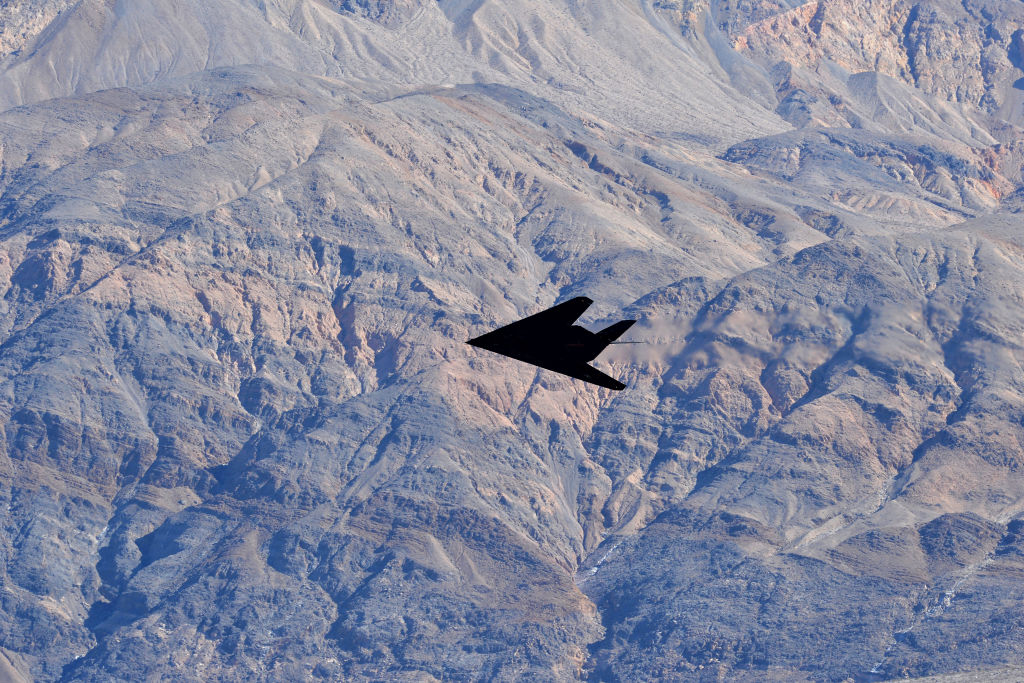 Plane flying over mountains
