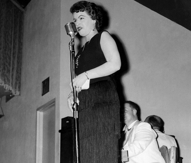 Patsy sings onstage