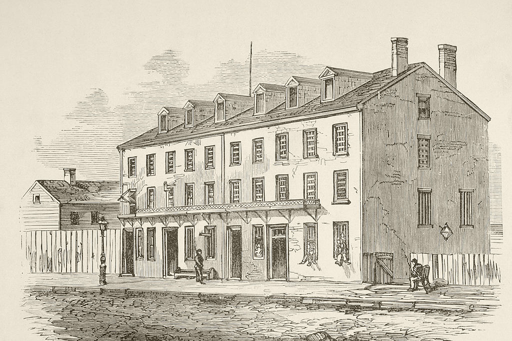 A drawing depicts a Virginia warehouse from the 1800s that was converted to a prison during the Civil War.