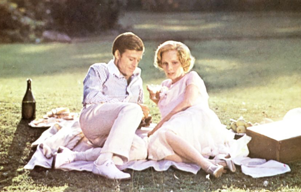 Mia Farrow and Robert Redford having a picnic -1137207144