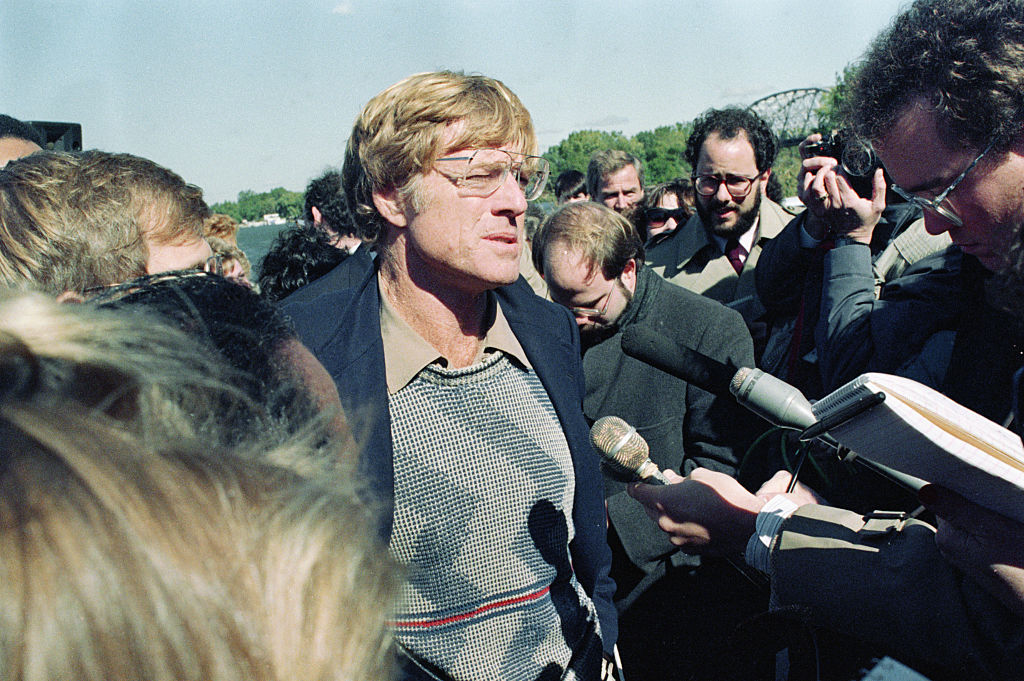 Redford talking to reporters