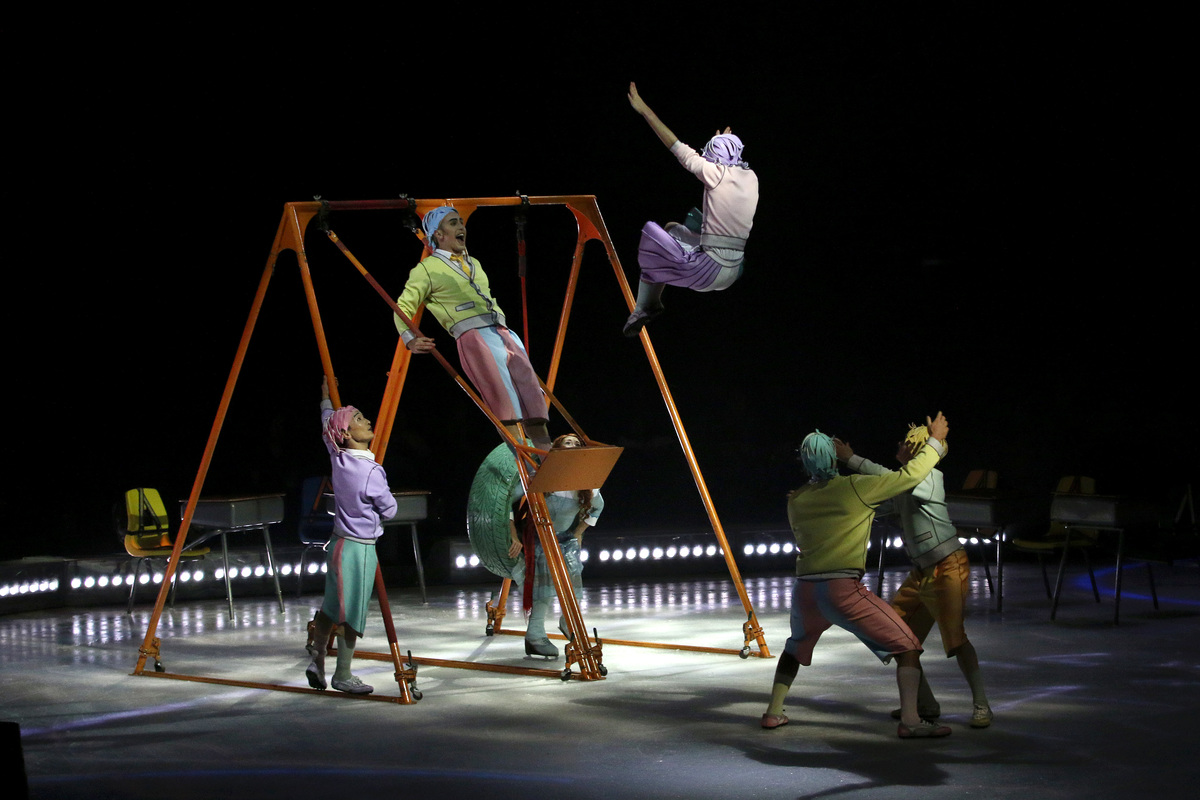 Acrobats on ice perform their act during a preview opportunity for the press ahead of the Cirque Du Soleil show 'CRYSTAL