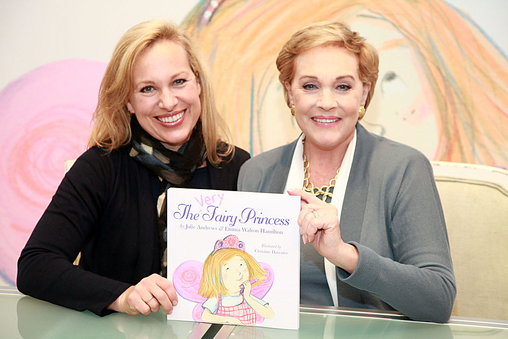 Julie and her daughter Emma pose with their book A Very Fairy Princess.