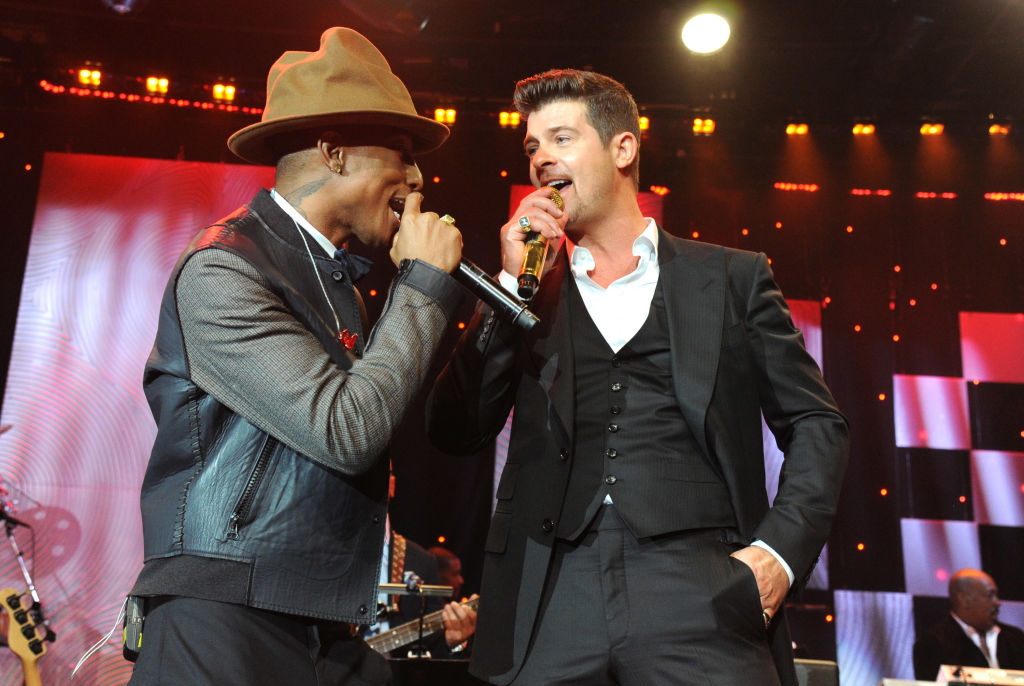 Robin Thicke and Pharrell Williams performing