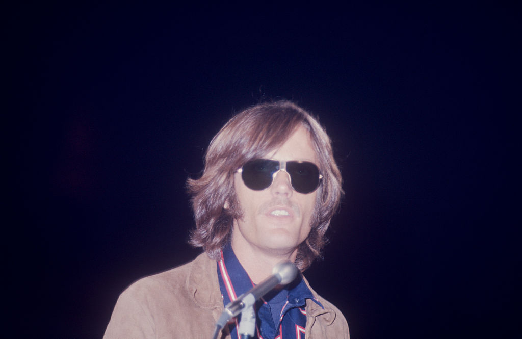 Fonda speaking into a microphone