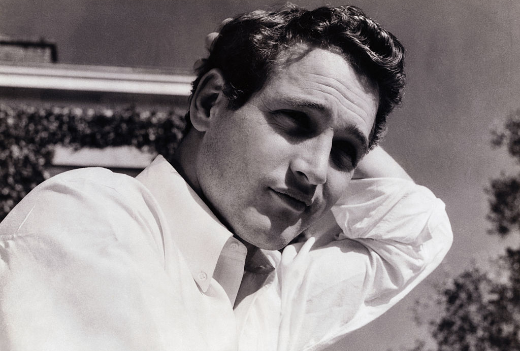 Newman poses for a picture