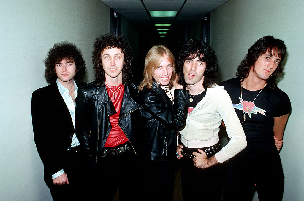 The band posing backstage