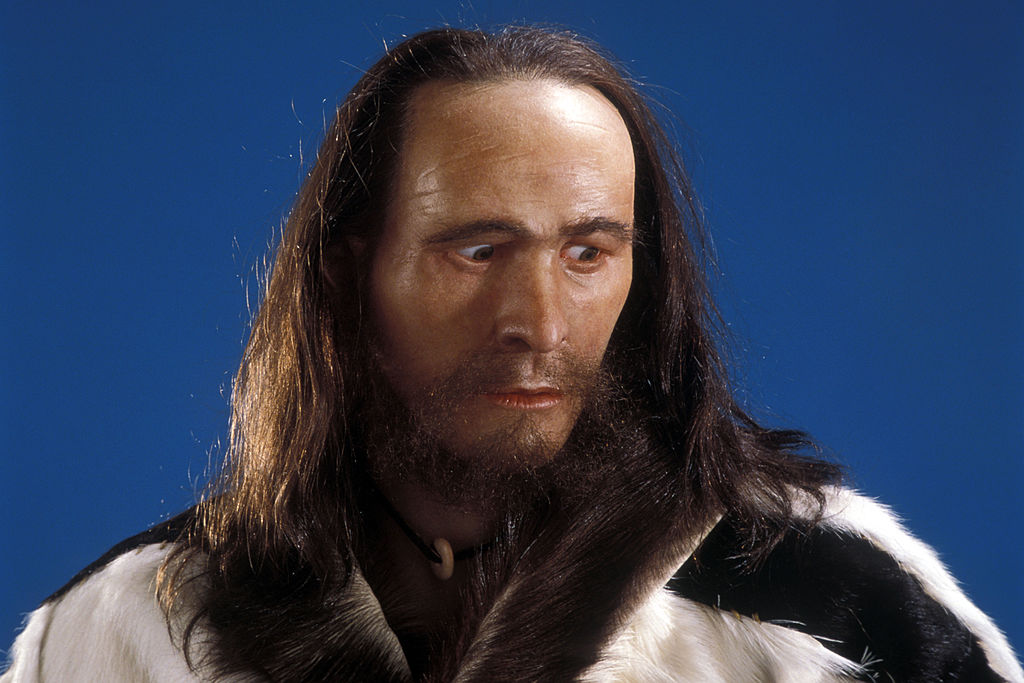 a recreation of otzi man displayed in france in 1997
