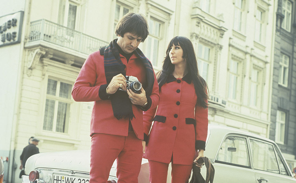 Sonny and Cher in matching red outfits