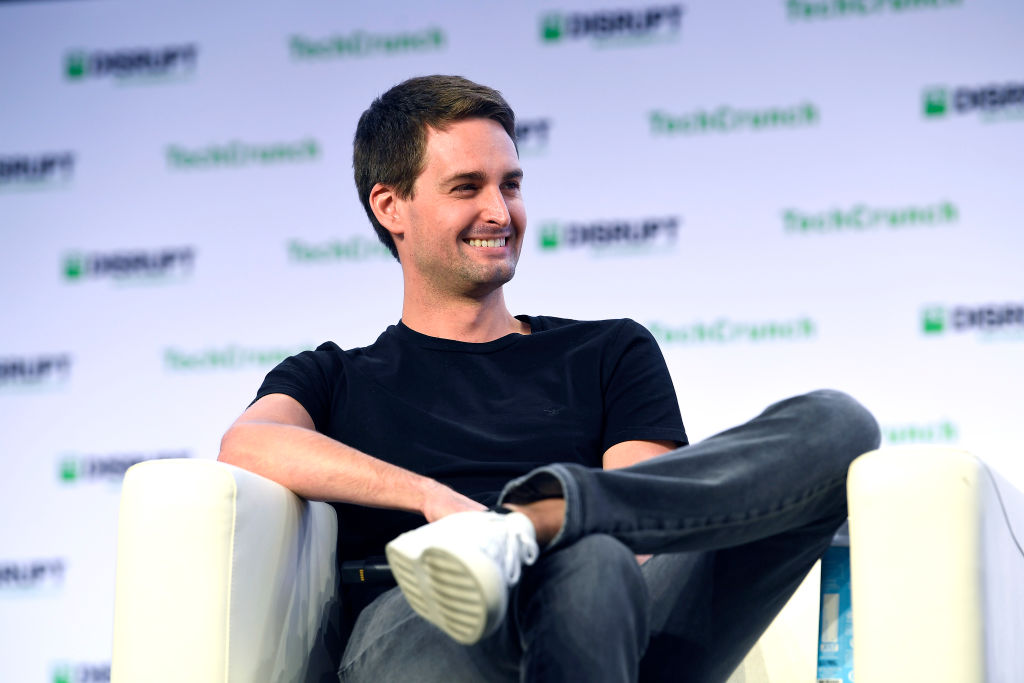 van Spiegel speaks onstage during TechCrunch