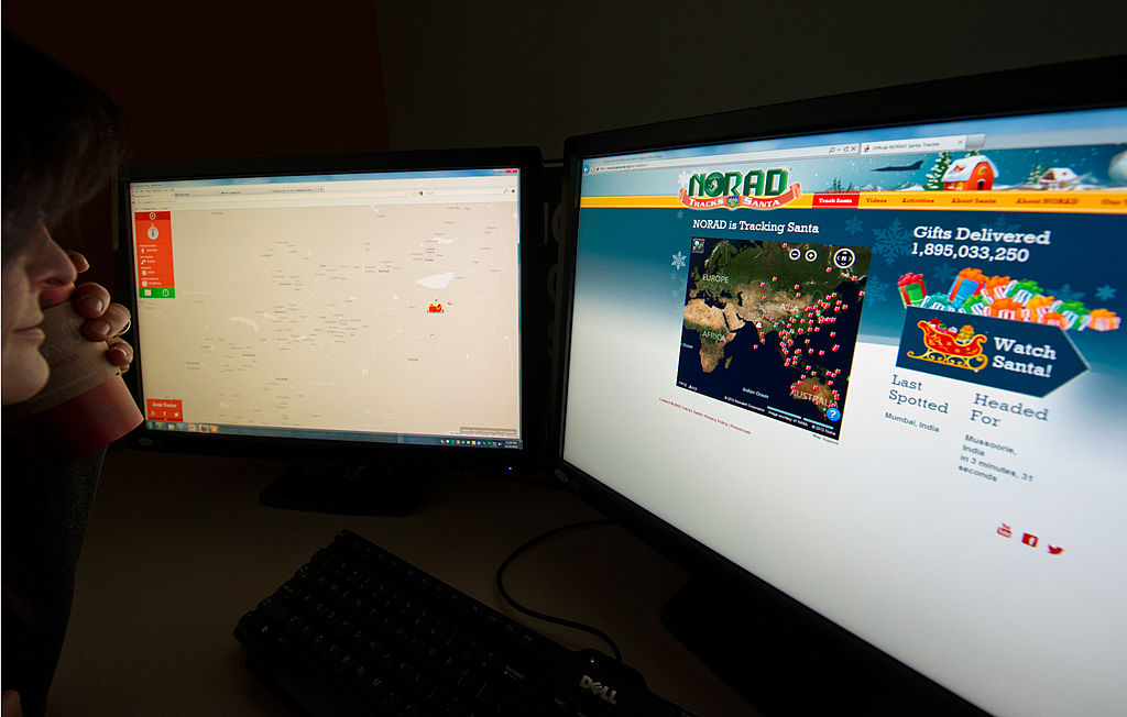 Woman using NORAD Santa Tracker 