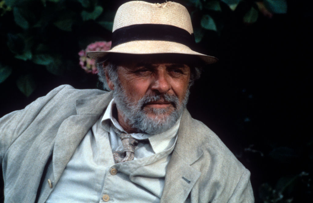 Anthony has a thick, gray beard while filming August.
