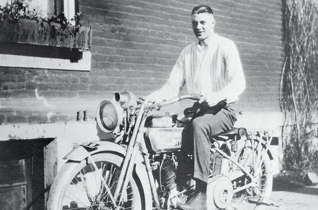 Cooper on a motorcycle