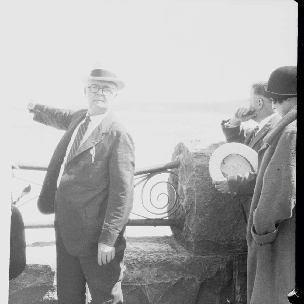pointing to the Falls