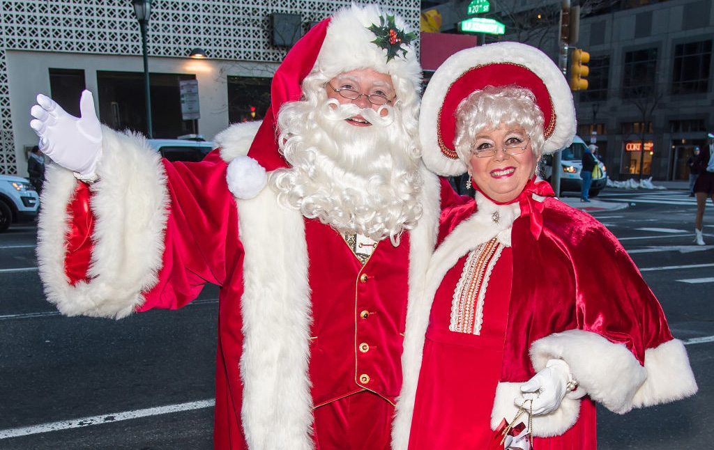 Couple dressed up as the Claus' 