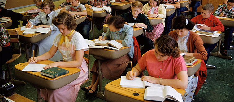 students at their desks in the 1950s