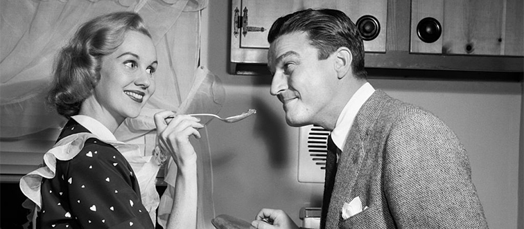housewife feeding her husband