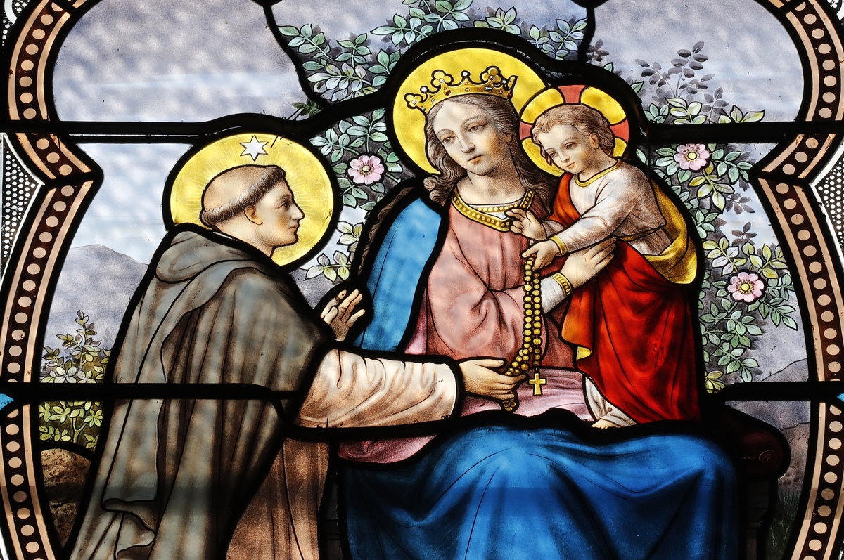 In this stained glass depiction, Saint Anthony visits baby Jesus.