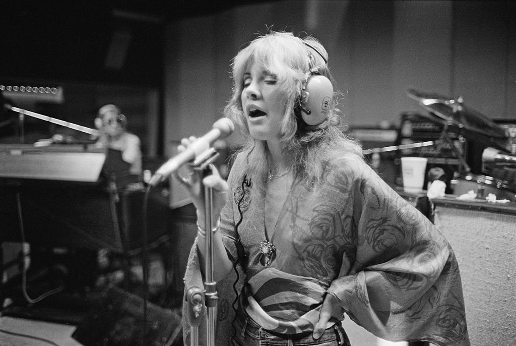 Stevie Nicks sings in a recording studio.