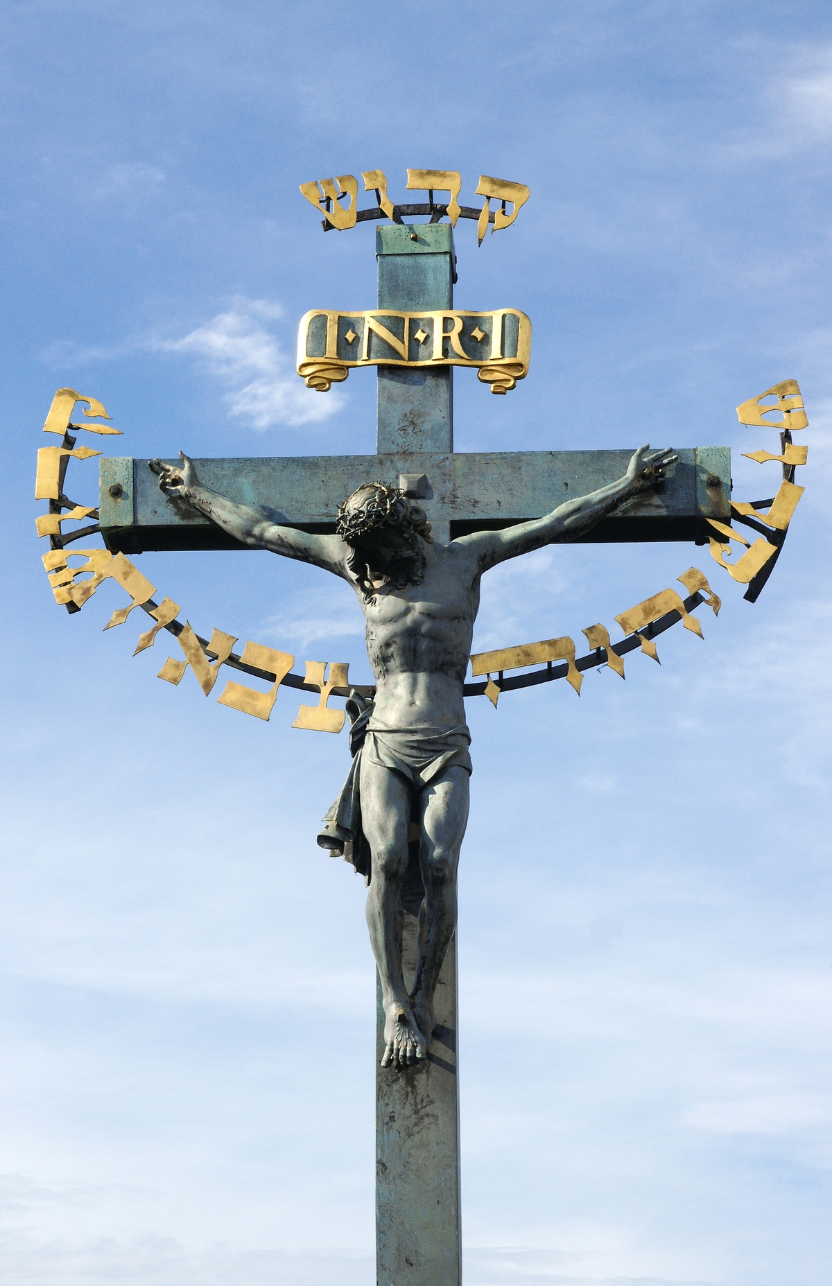 A 17th century sculpture depicts Christ's crucifixion.