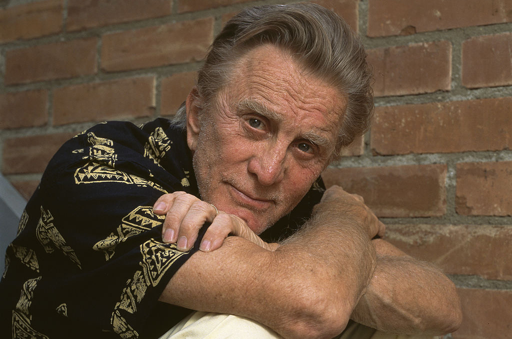 Douglas with arms crossed