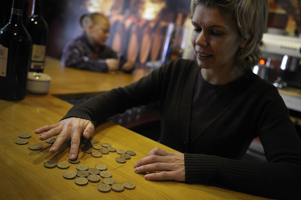 Woman with gold coins