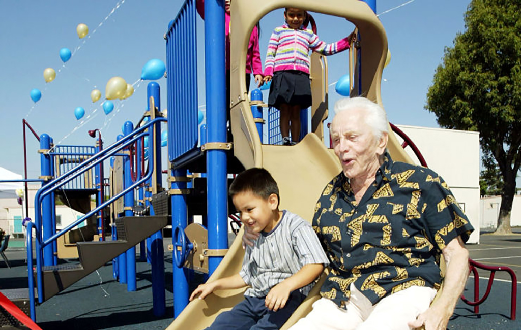 Kirk Douglas on a slide