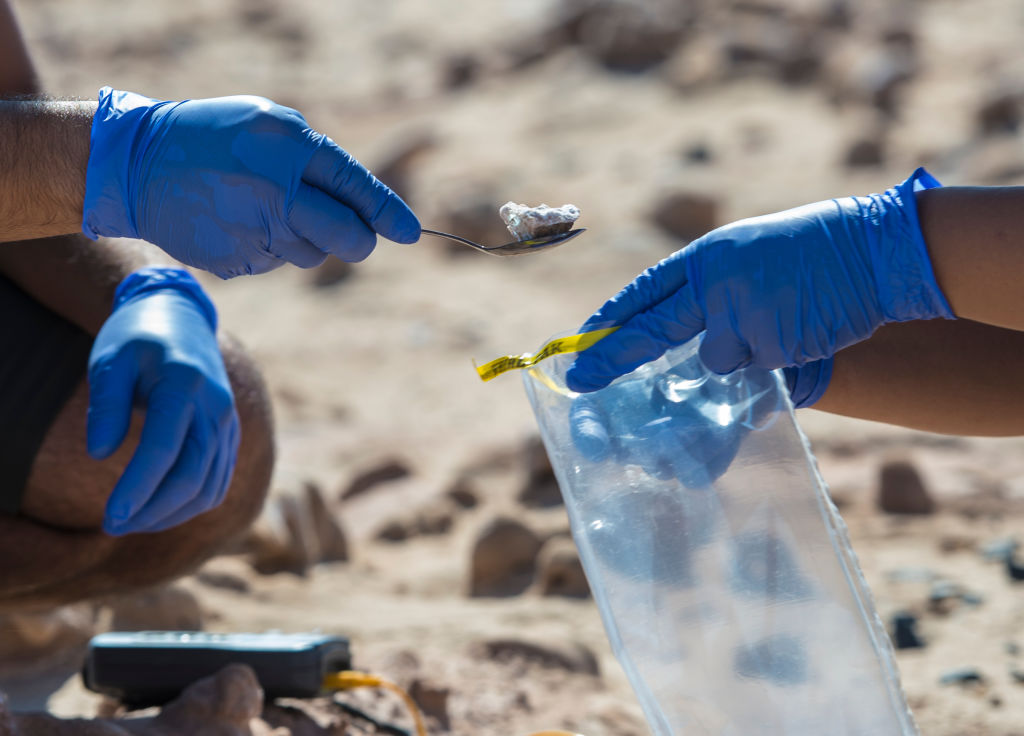 Scientists taking samples