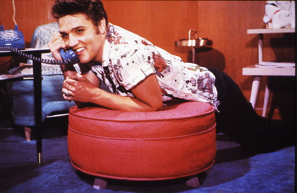 a young elvis on the phone